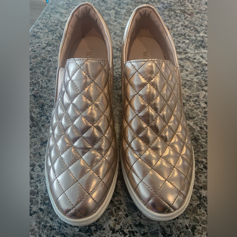 Metallic rose gold wedge slip on fashion sneakers. Size 8.